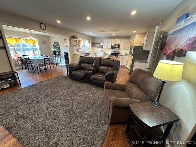 living room with dark wood-type flooring