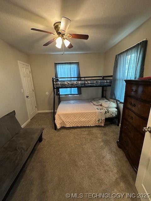 bedroom featuring carpet and ceiling fan