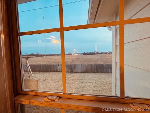 doorway featuring a rural view