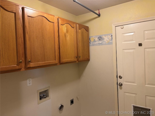 laundry room featuring cabinet space, hookup for a washing machine, and electric dryer hookup