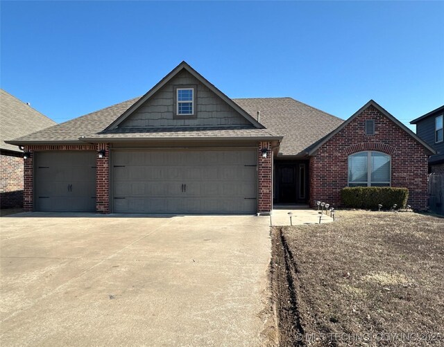 view of front of property featuring a garage