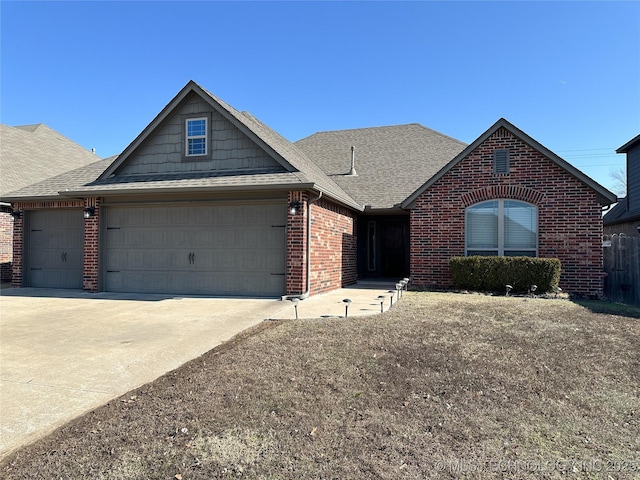 view of front of property with a garage