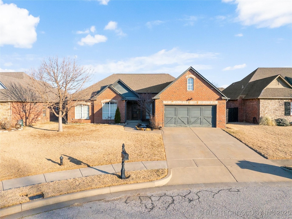 ranch-style home featuring a garage