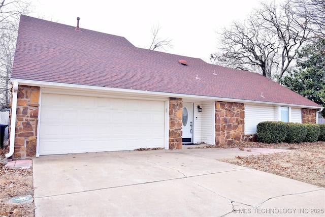 ranch-style house featuring a garage