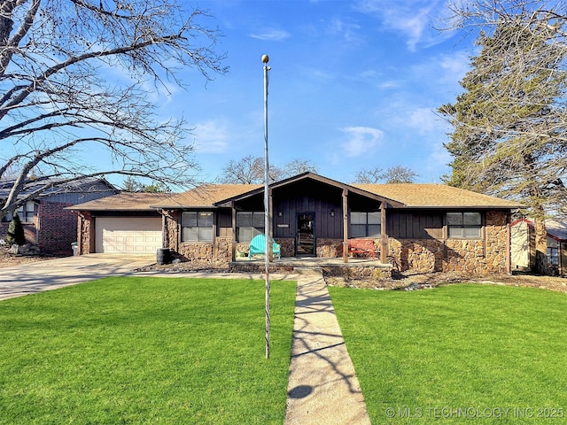 ranch-style house with a garage and a front yard