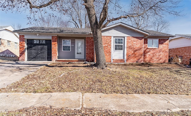 single story home featuring a garage