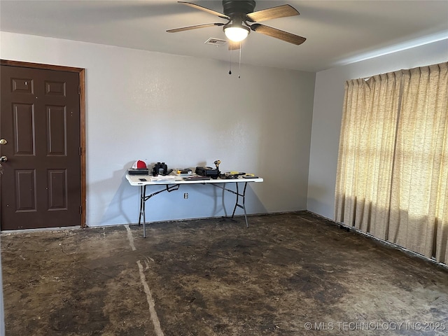 interior space with ceiling fan