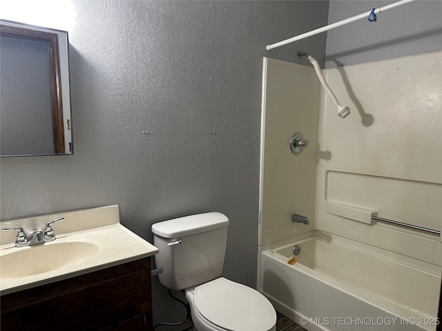 full bathroom with vanity, toilet, and shower / bathing tub combination