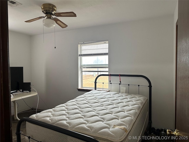 bedroom featuring ceiling fan