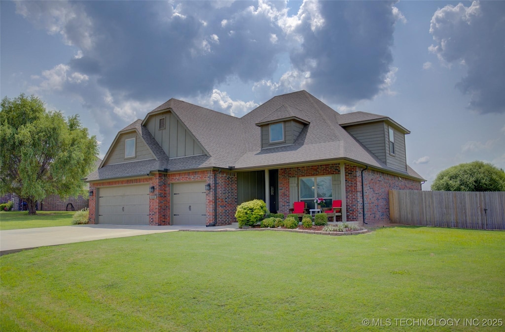 view of front facade featuring a garage and a front lawn