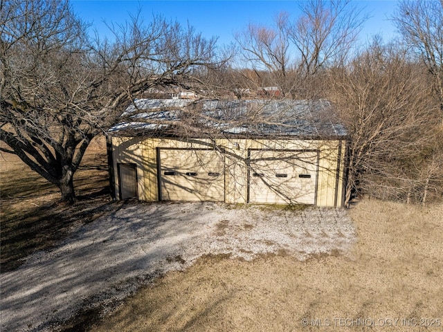 view of outbuilding featuring a garage