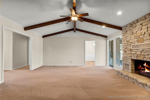 unfurnished living room with a stone fireplace, light colored carpet, lofted ceiling with beams, a textured ceiling, and ceiling fan