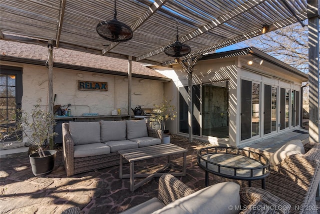 view of patio with a pergola, outdoor lounge area, and ceiling fan