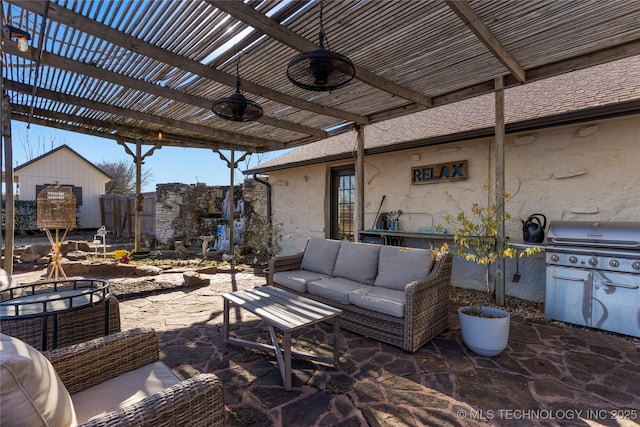 view of patio featuring outdoor lounge area, ceiling fan, and a pergola