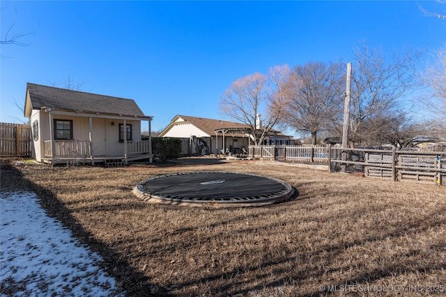 view of yard with a trampoline