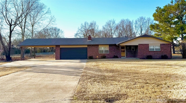 single story home with a garage and a front yard