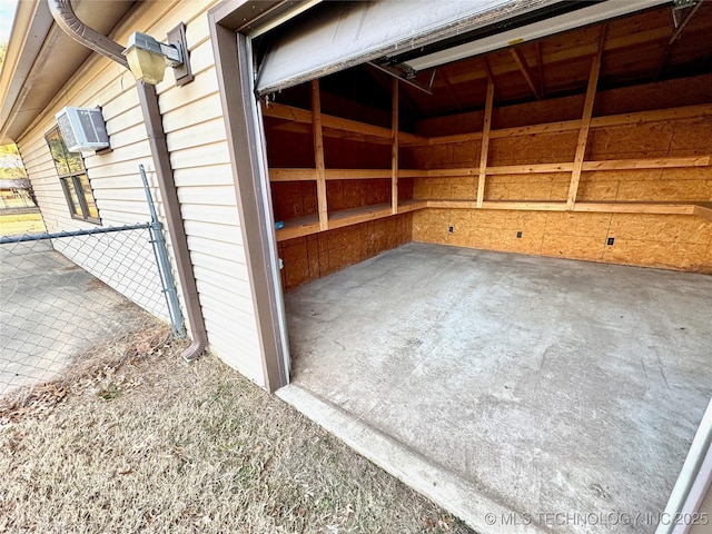 storage featuring a wall mounted air conditioner