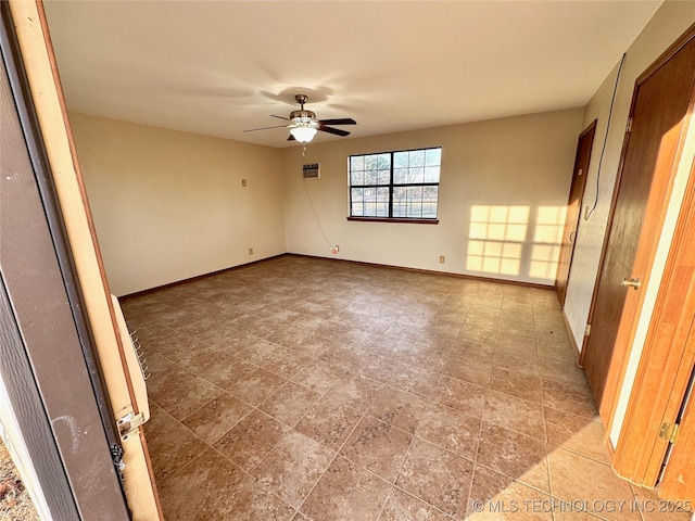 unfurnished room featuring ceiling fan