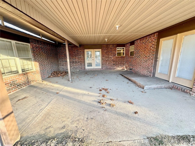 view of patio featuring french doors