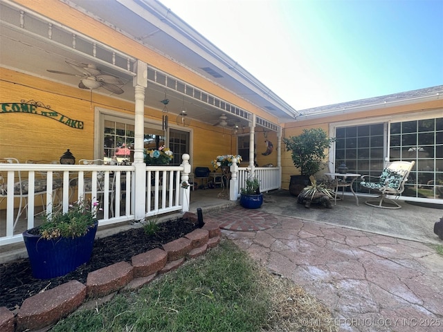 view of patio featuring ceiling fan and covered porch