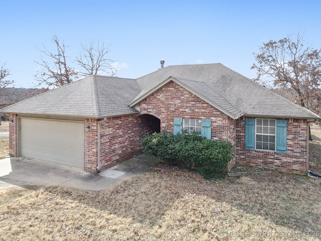 single story home featuring a garage