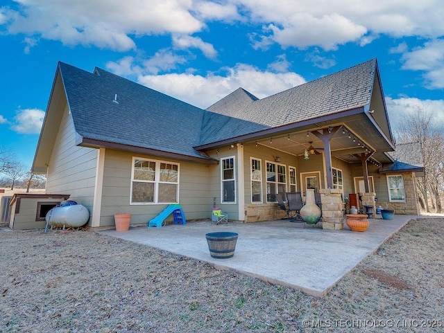 rear view of house with a patio and ceiling fan