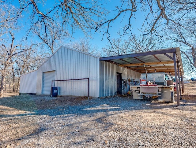 view of outbuilding with a garage