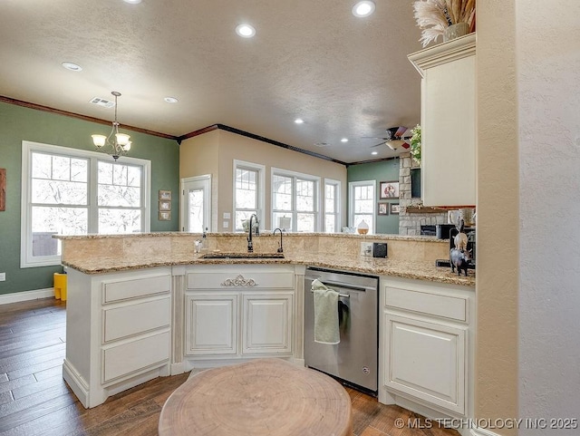 kitchen with hardwood / wood-style floors, dishwasher, sink, kitchen peninsula, and crown molding