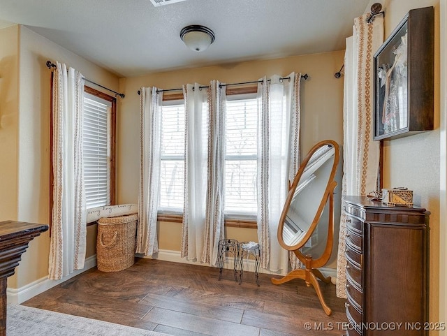 living area featuring dark hardwood / wood-style floors