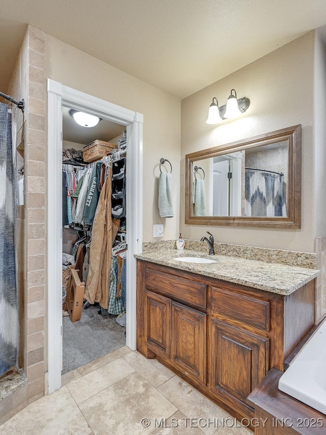 bathroom featuring vanity and tile patterned floors