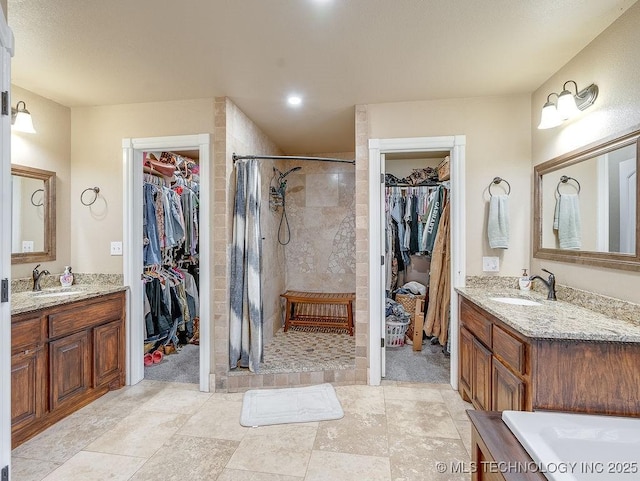 bathroom featuring vanity and a shower with curtain