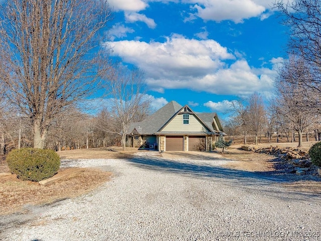 exterior space with a garage