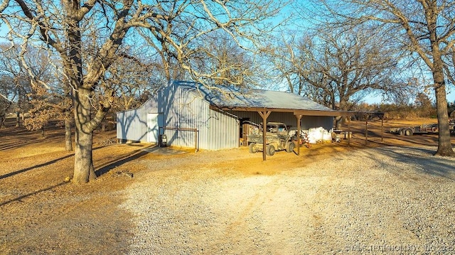 exterior space featuring an outdoor structure