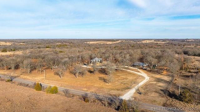 birds eye view of property featuring a rural view