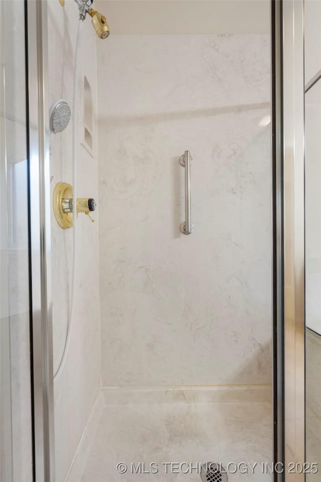 bathroom featuring an enclosed shower