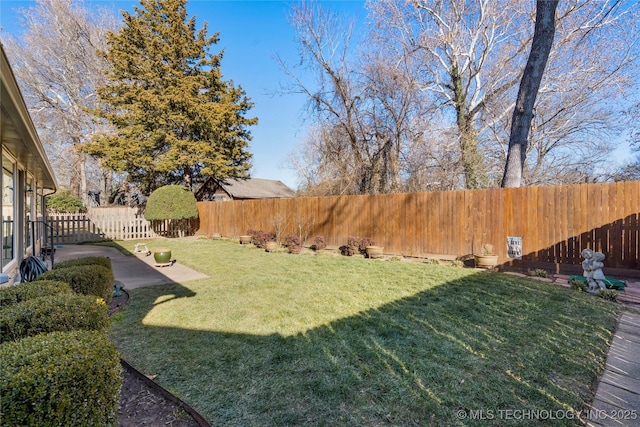 view of yard with a patio area