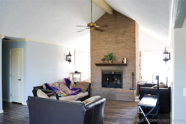 living room featuring dark hardwood / wood-style flooring, lofted ceiling with beams, and a textured ceiling