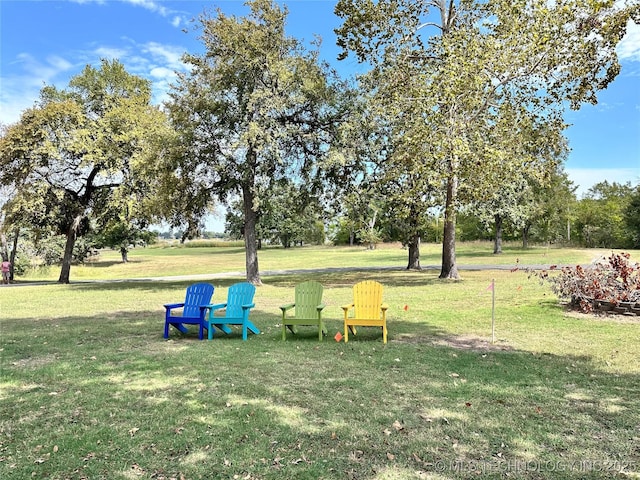 surrounding community featuring a lawn