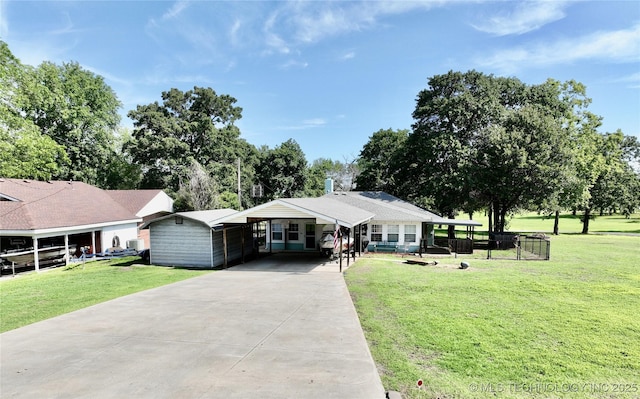 ranch-style home with a carport and a front yard