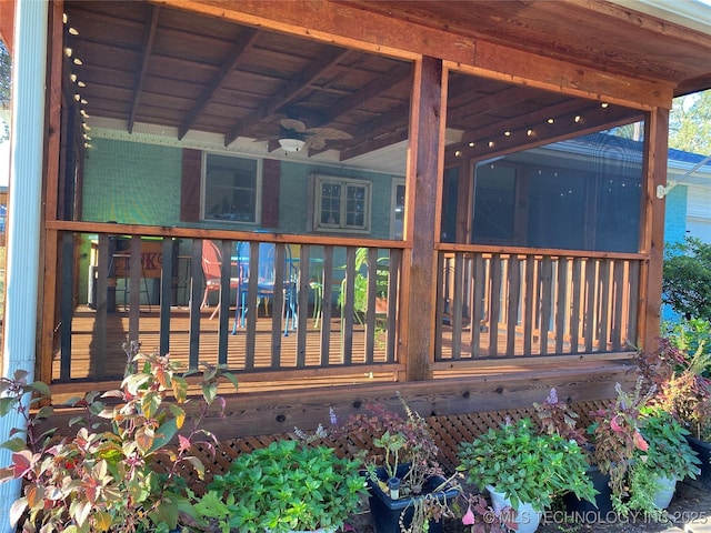 wooden deck with ceiling fan