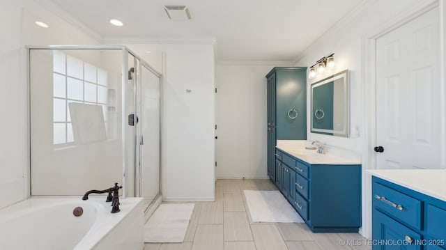 bathroom with vanity, crown molding, and plus walk in shower