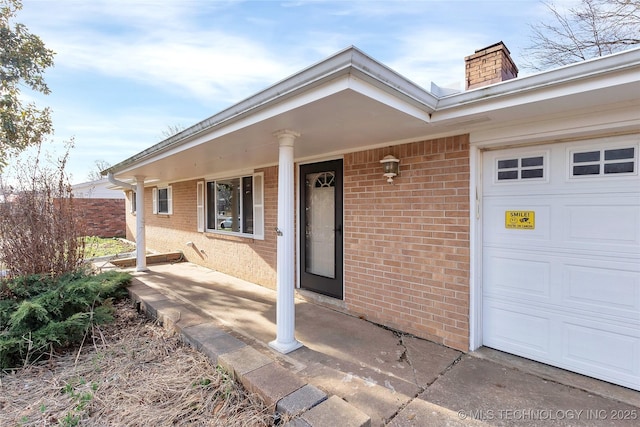 entrance to property with a garage