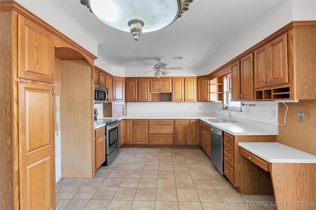 kitchen featuring tasteful backsplash, sink, light tile patterned floors, ceiling fan, and stainless steel appliances