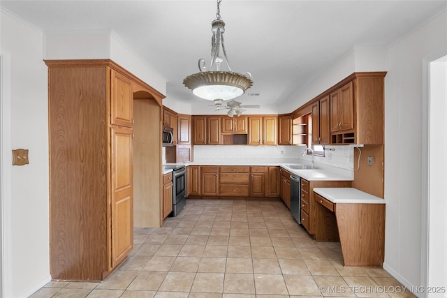 kitchen with tasteful backsplash, sink, hanging light fixtures, light tile patterned floors, and stainless steel appliances