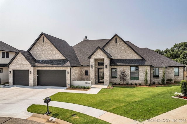 french country style house featuring a front yard