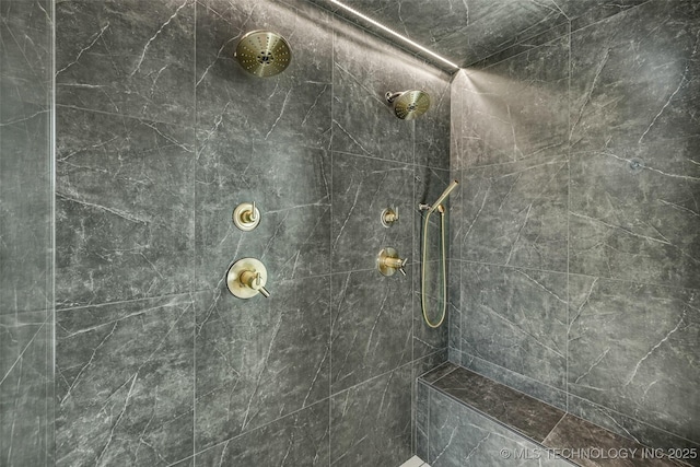 bathroom featuring tiled shower