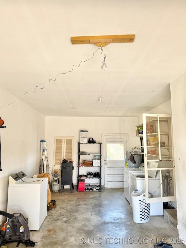 garage featuring separate washer and dryer