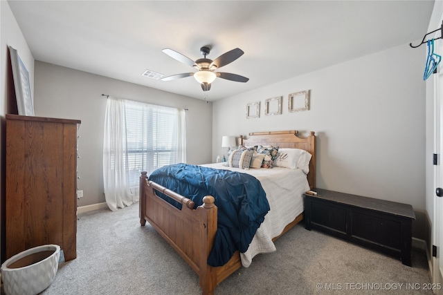 bedroom with light colored carpet and ceiling fan