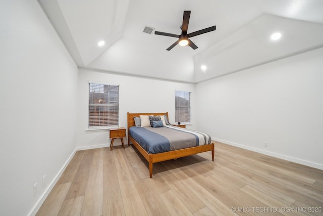 bedroom with lofted ceiling, light hardwood / wood-style flooring, and ceiling fan