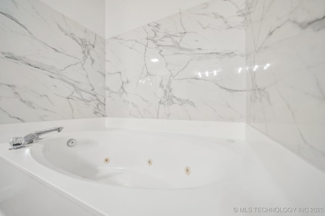 bathroom with a washtub